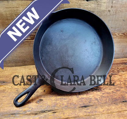 1920’S Favorite Piqua Ware No. 9 A Cast Iron Skillet With Heat Ring And ’Smiley’ Logo.