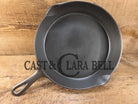 1920’s Favorite Piqua Ware No. 9 B cast iron Skillet with Heat Ring and ’Smiley’ Logo. Gorgeous skillet restored and