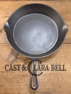 1920’s Favorite Piqua Ware No. 9 B cast iron Skillet with Heat Ring and ’Smiley’ Logo. Gorgeous skillet restored and