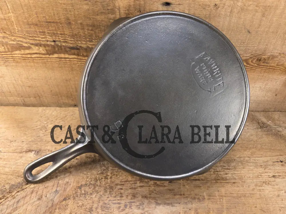 1920’s Favorite Piqua Ware No. 9 B cast iron Skillet with Heat Ring and ’Smiley’ Logo. Gorgeous skillet restored and