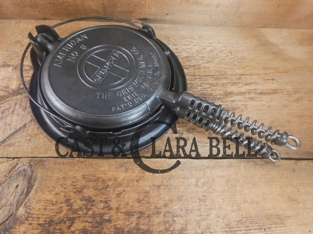 1920’s Griswold No. 8 Waffle Iron (314/315) with low (913) bailed base. Makes crispy waffles! Waffle Iron