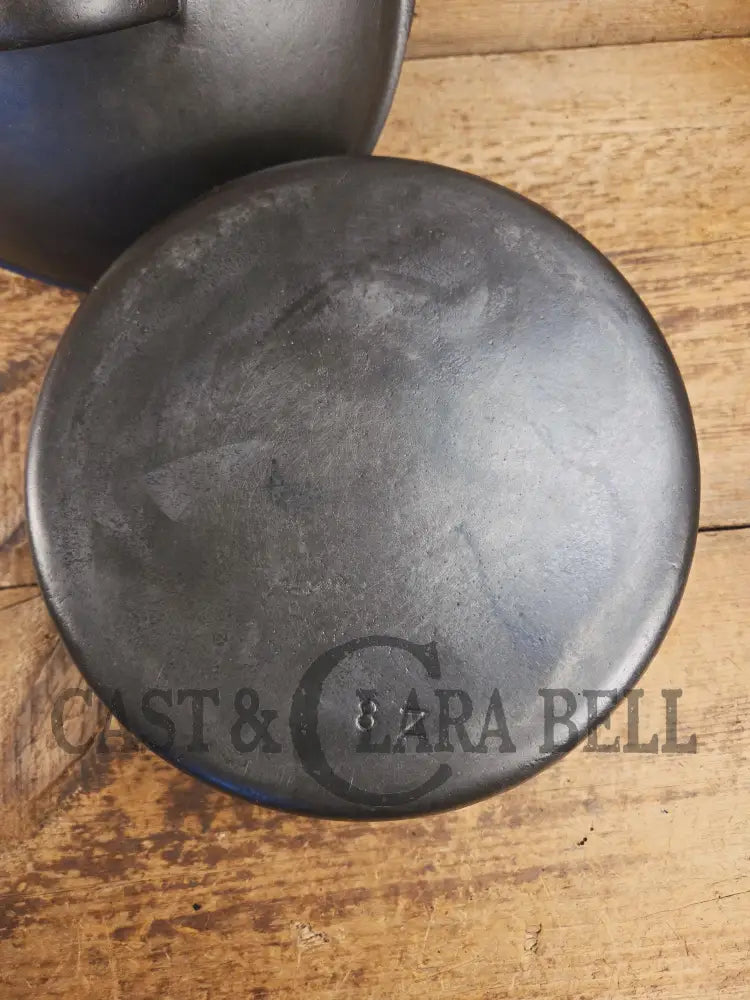 1930’s Beautiful fully restored Wagner #8 Dutch Oven with Sawtooth drip style lid. Perfect for soups breads or stews!