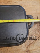 1930’s era Lodge 7 Long Griddle. Very handy size to have for the grill or stove top! Restored and ready to Use! Skillet