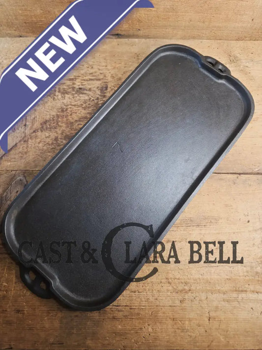 1930’s era Lodge 7 Long Griddle. Very handy size to have for the grill or stove top! Restored and ready to Use! Skillet
