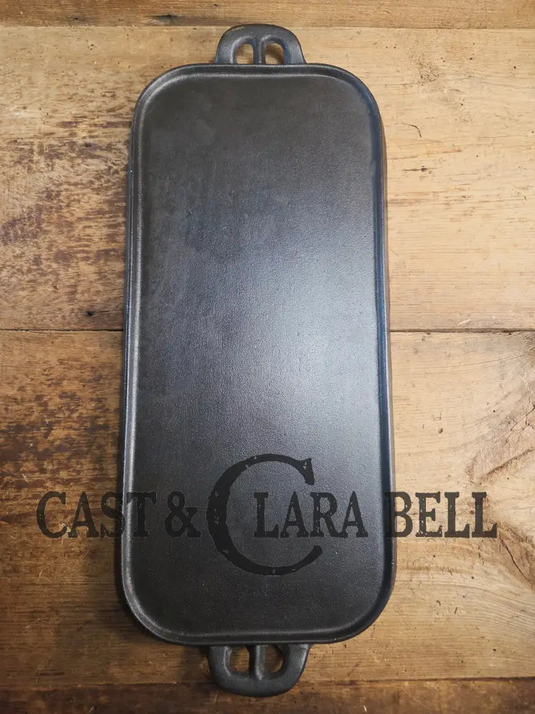 1930’s era Lodge 7 Long Griddle. Very handy size to have for the grill or stove top! Restored and ready to Use! Skillet