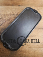 1930’s era Lodge 7 Long Griddle. Very handy size to have for the grill or stove top! Restored and ready to Use! Skillet