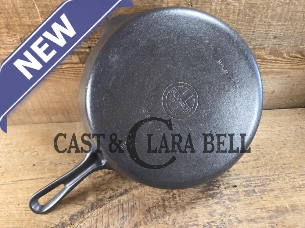 1940’s Griswold No. 8 Cast Iron Skillet with GROOVE handle and Small Block Logo 704 E. In beautiful condition. Almost