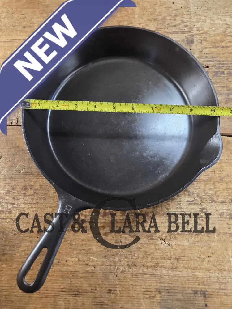 1940’s Griswold No. 8 Cast Iron Skillet with GROOVE handle and Small Block Logo 704 E. In beautiful condition. Almost