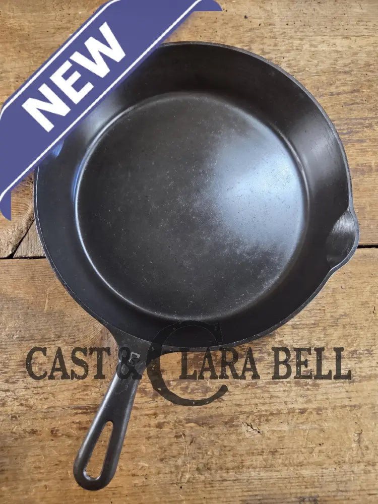 1940’s Griswold No. 8 Cast Iron Skillet with GROOVE handle and Small Block Logo 704 E. In beautiful condition. Almost