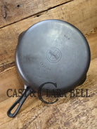 1940’s Griswold No. 8 Cast Iron Skillet with GROOVE handle and Small Block Logo 704 F. In beautiful condition. Almost