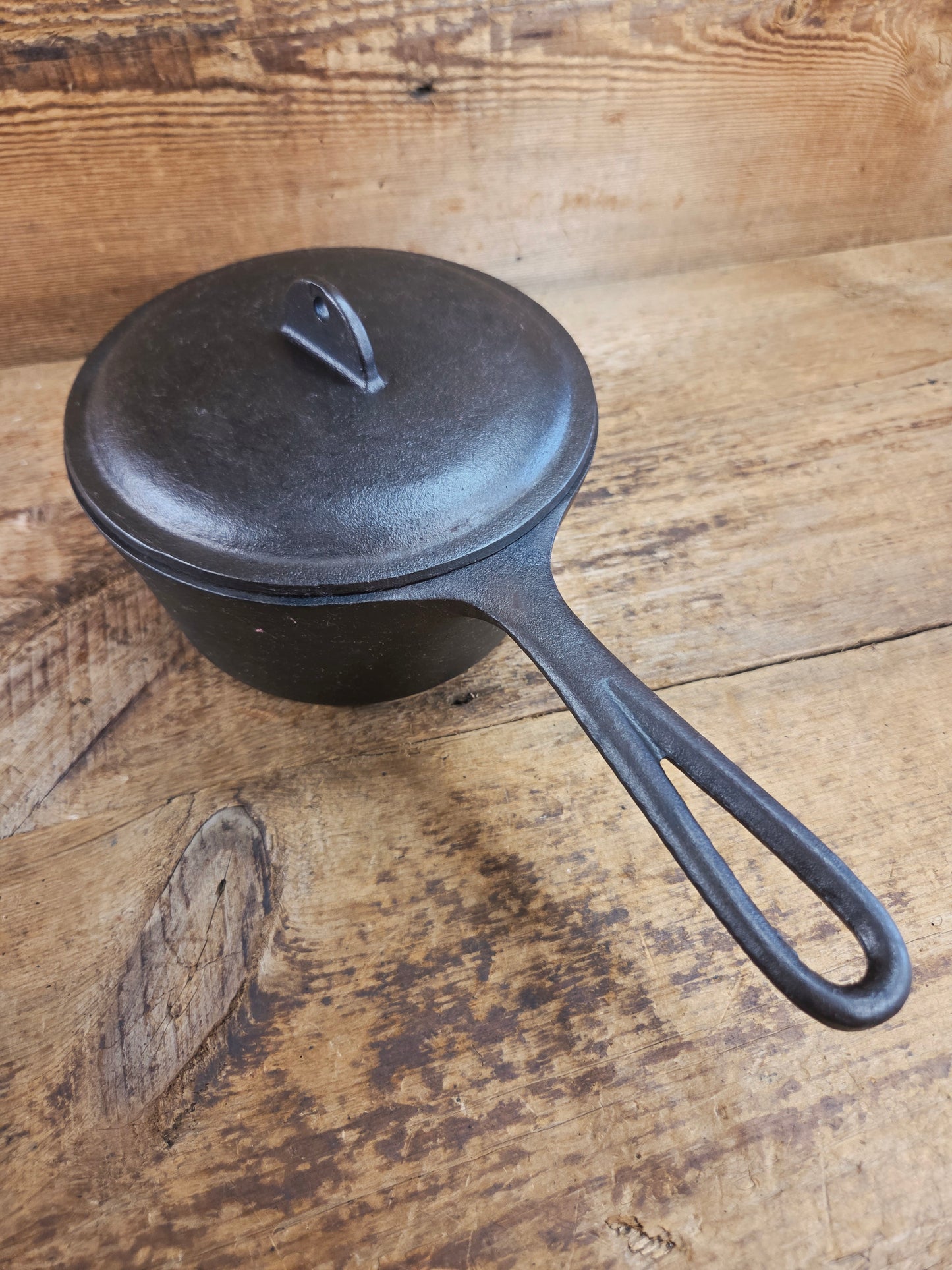 Lovely Lodge #2 quart sauce pan with lid!  Perfect bean pot for your grill!