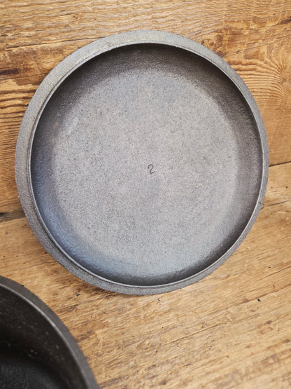Lovely Lodge #2 quart sauce pan with lid!  Perfect bean pot for your grill!