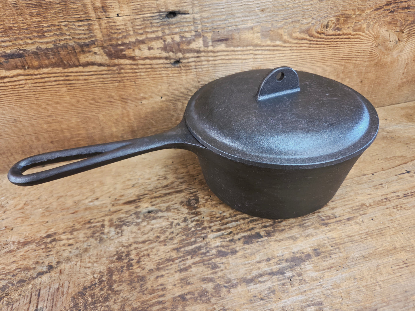 Lovely Lodge #2 quart sauce pan with lid!  Perfect bean pot for your grill!
