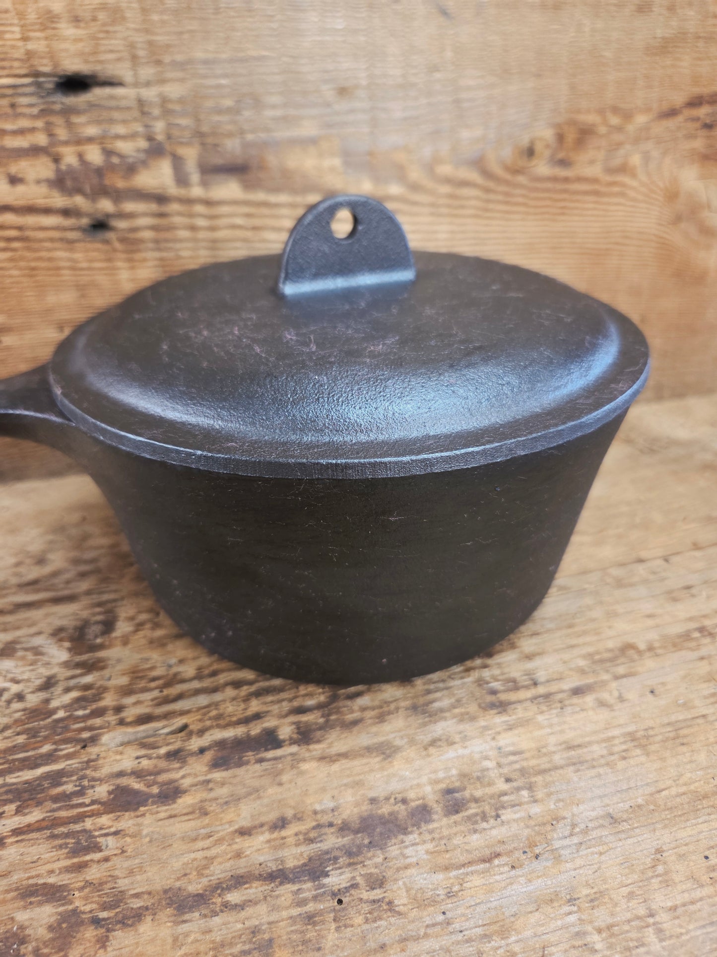 Lovely Lodge #2 quart sauce pan with lid!  Perfect bean pot for your grill!
