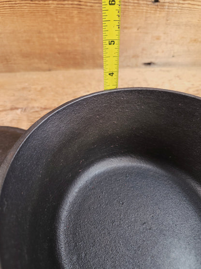 Lovely Lodge #2 quart sauce pan with lid!  Perfect bean pot for your grill!