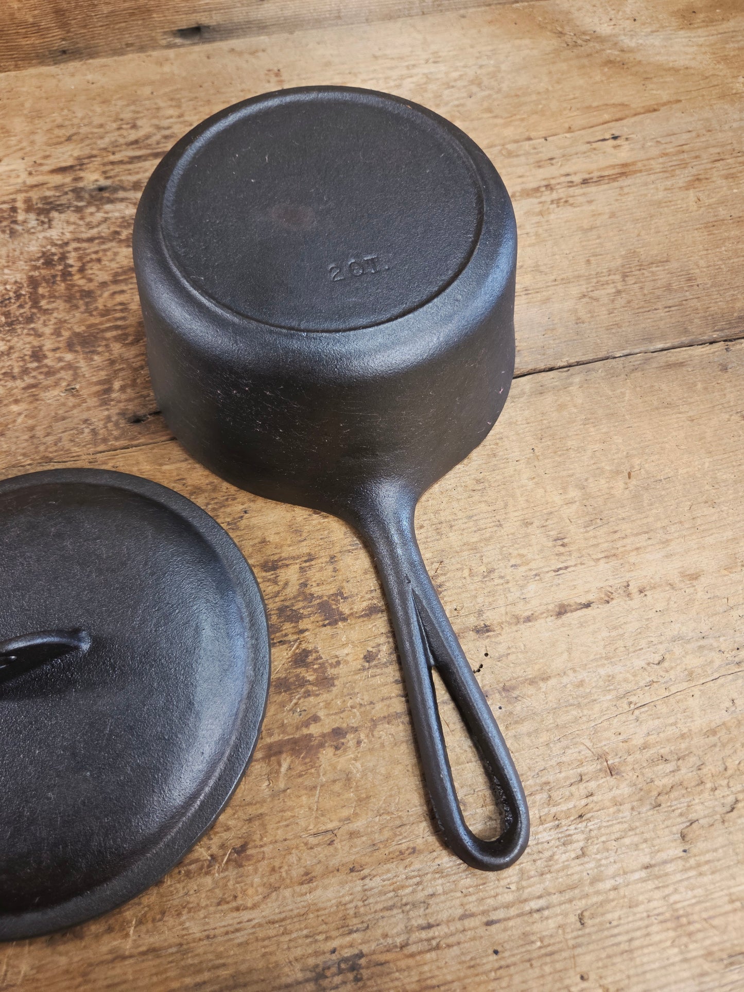 Lovely Lodge #2 quart sauce pan with lid!  Perfect bean pot for your grill!