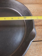 Awesome and tough to find! Scarce smooth bottom #12 Vollrath cast iron skillet. This is a conversation starter! Skillet