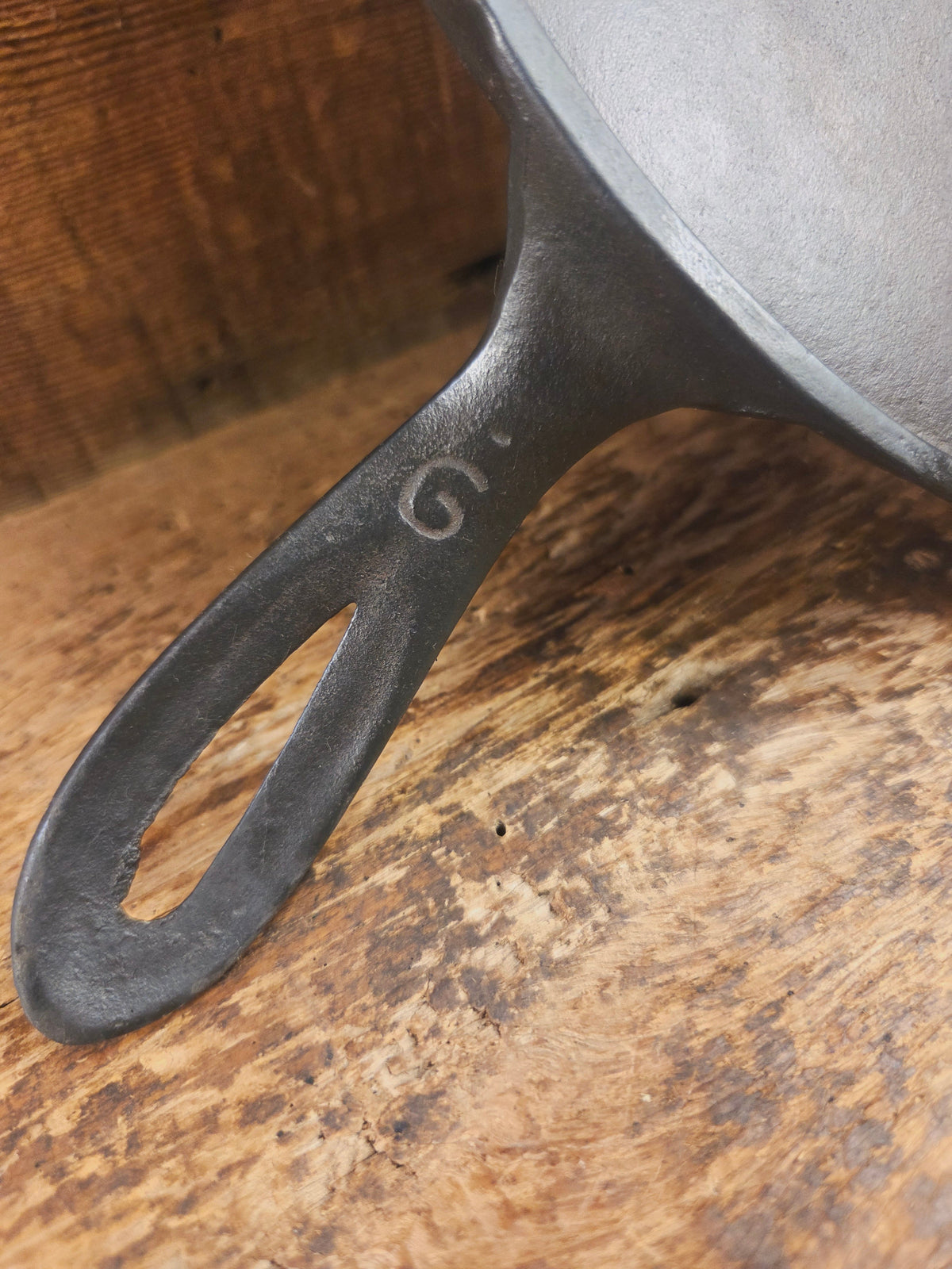 1920’s Favorite Piqua Ware #9 Round Cast Iron Griddle with Smiley Logo and Ghost mark block logo. Griddle