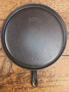 Gorgeous and not often seen #9 Puritan round griddle by Griswold. Perfect for everyday pancakes grilled cheese or oven