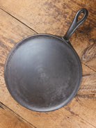 Gorgeous and not often seen #9 Puritan round griddle by Griswold. Perfect for everyday pancakes grilled cheese or oven