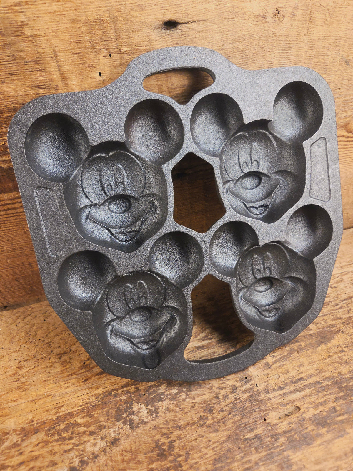 So cool! Lodge made Mickey Mouse Gem Pan. Makes great mini cakes! - Bakeware