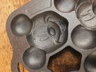 So cool! Lodge made Mickey Mouse Gem Pan. Makes great mini cakes! - Bakeware