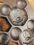 So cool! Lodge made Mickey Mouse Gem Pan. Makes great mini cakes! - Bakeware