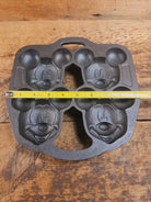 So cool! Lodge made Mickey Mouse Gem Pan. Makes great mini cakes! - Bakeware