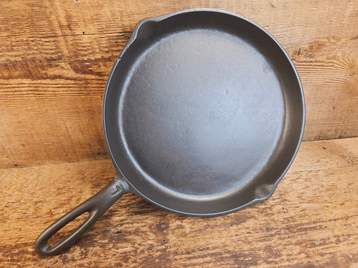 Gorgeous and harder to find Martin Stove & Range No. 7 Skillet Griddle with Hamburger Logo. Versatile restored and