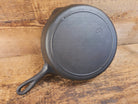 Gorgeous Mid 1900’s Lodge #6 Skillet with Three Notch Heat Ring with ’7 and 5’’ makers mark. Perfect for saute & sides