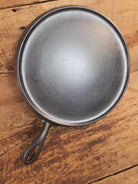 Super unique and gorgeous!! #740 Griswold #10 Round handled griddle with SLANT logo and NO Circles! Very different