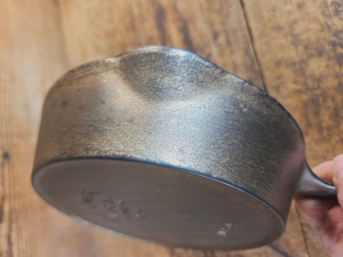 HTF! 1924 Wagner Ware #4 Cast Iron Skillet with Heat Ring 1054. Plating outside black iron inside. Beautiful patina!