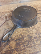 HTF! 1924 Wagner Ware #4 Cast Iron Skillet with Heat Ring 1054. Plating outside black iron inside. Beautiful patina!
