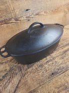 A bread maker’s dream. Very Hard to Find Wagner Stylized Logo Oval Roaster with Turtle Top sawtooth drip lid - Dutch