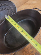 A bread maker’s dream. Very Hard to Find Wagner Stylized Logo Oval Roaster with Turtle Top sawtooth drip lid - Dutch