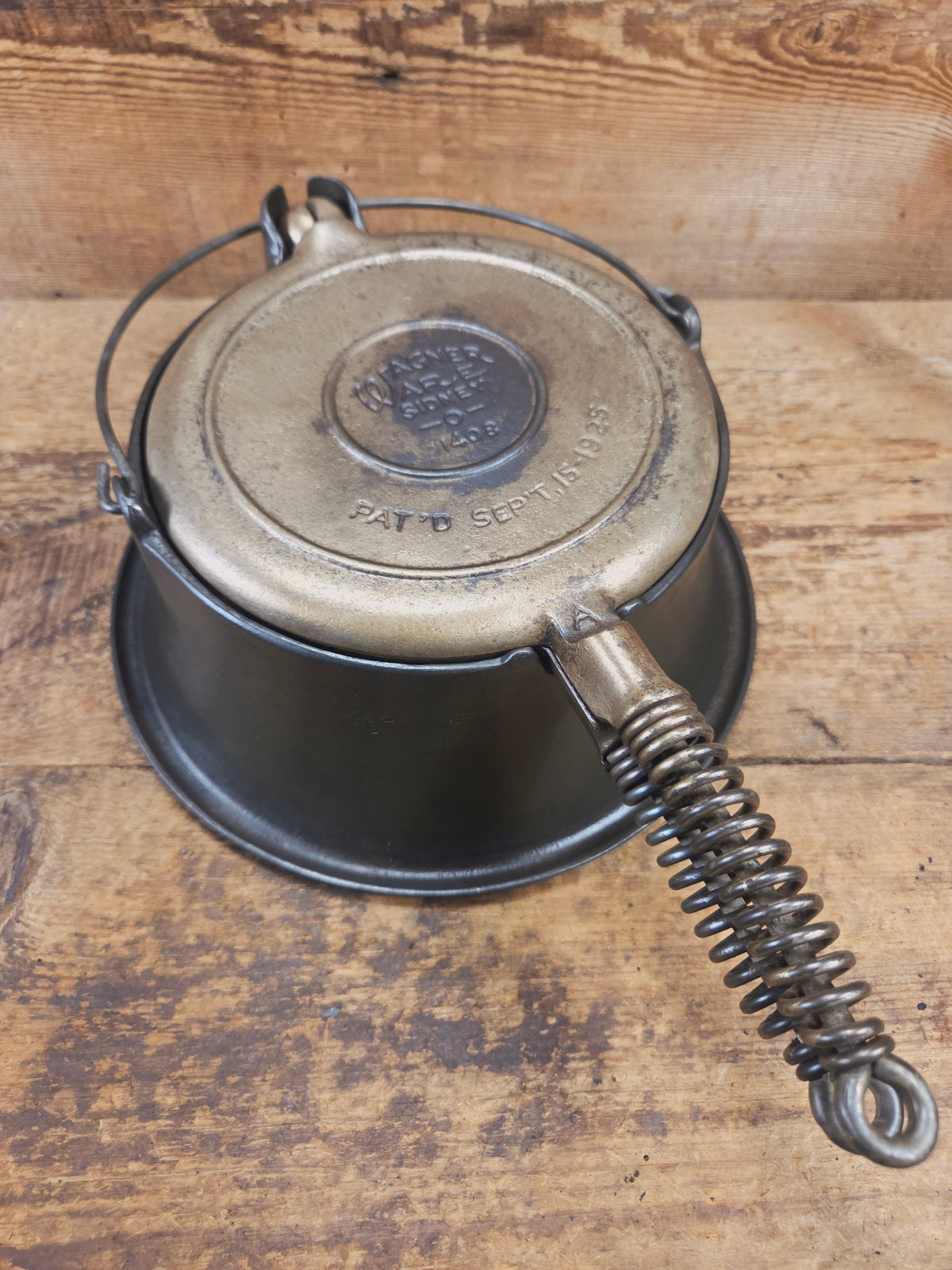 For the eclectic enthusiast!! 1930’s Era Wagner Tall Base Waffle Iron with Nickel Finish Paddles! Really cool patina!