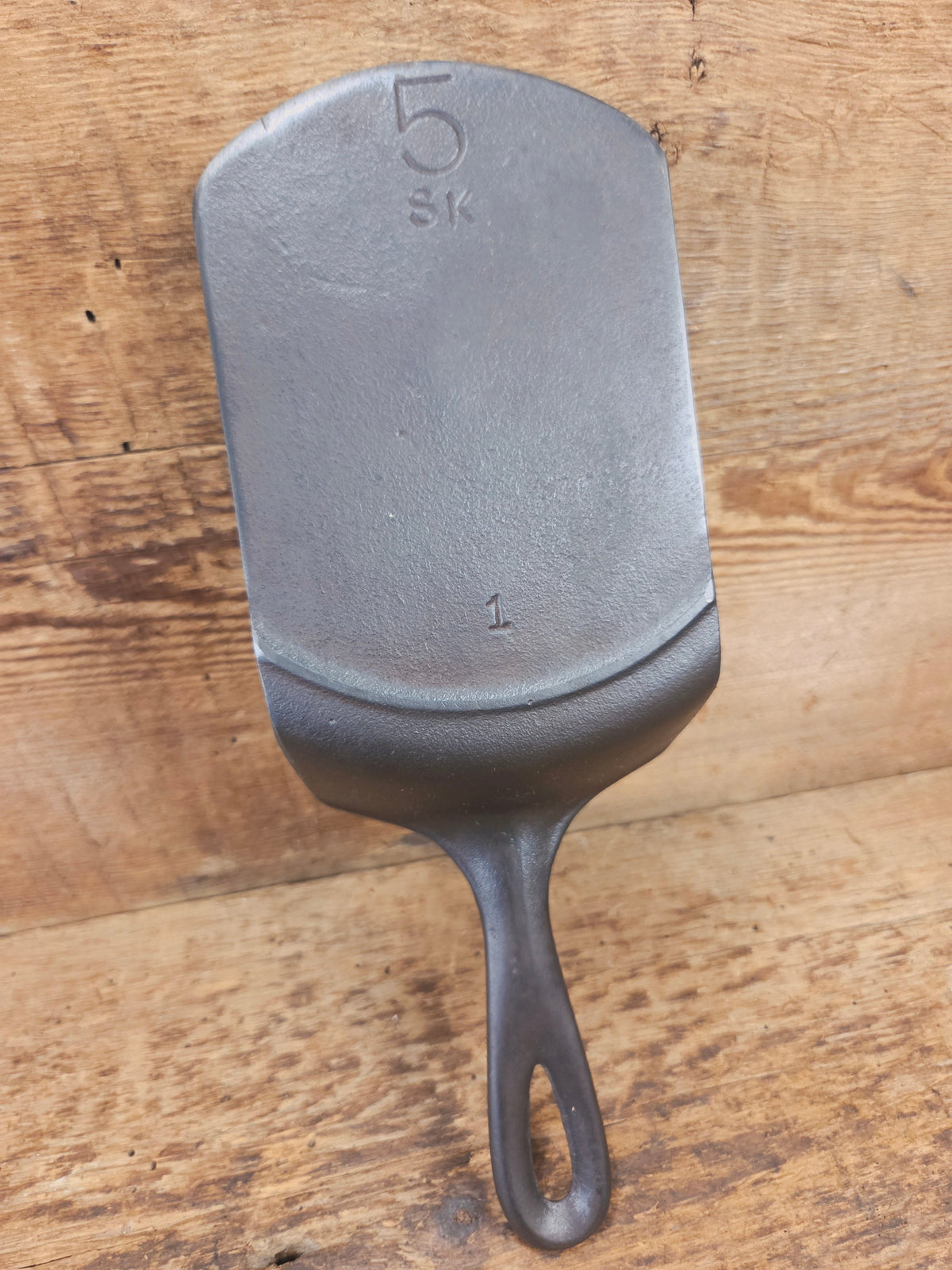 Custom made one of a kind vintage Lodge 5SK 1 repurposed spatula. Turned an ordinary cracked skillet into a grill