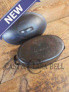 A bread maker’s dream. Very Hard to Find Wagner Stylized Logo Oval Roaster with Turtle Top sawtooth drip lid - Dutch