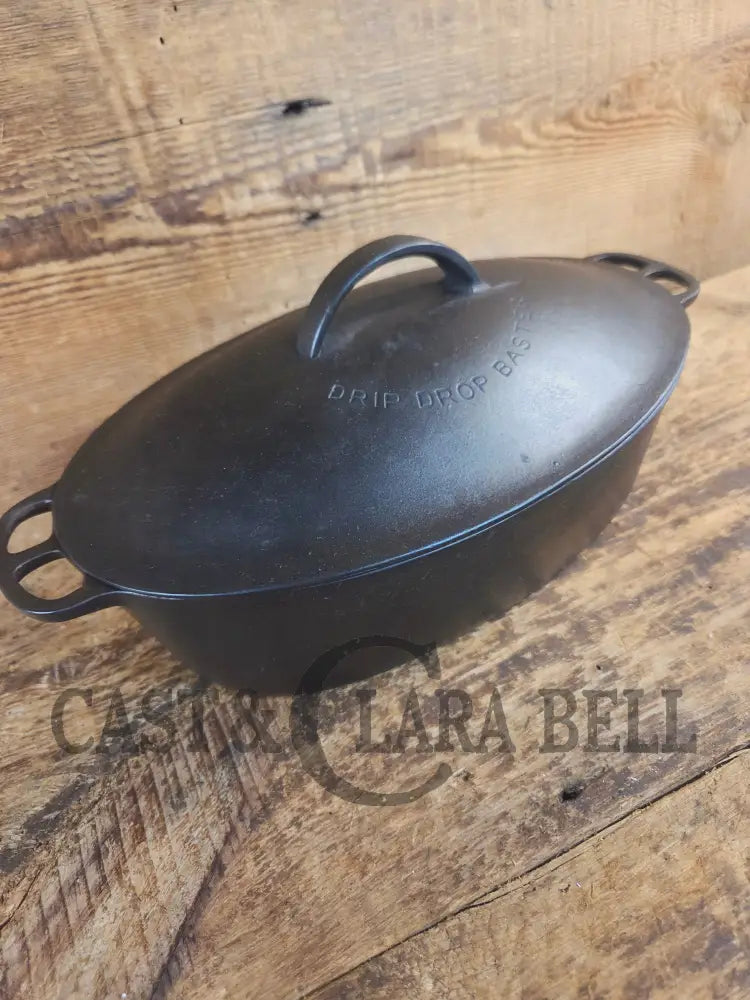 A bread maker’s dream. Very Hard to Find Wagner Stylized Logo Oval Roaster with Turtle Top sawtooth drip lid - Dutch
