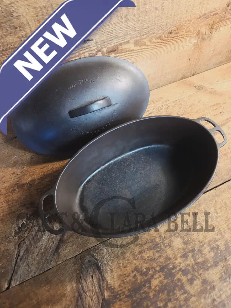 A bread maker’s dream. Very Hard to Find Wagner Stylized Logo Oval Roaster with Turtle Top sawtooth drip lid - Dutch