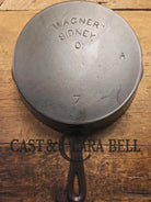 A favorite of ours! 1895-1910’s! Wagner Sidney #7 Cast Iron Skillet double Arc Logo and black iron Finish. ’A’ makers