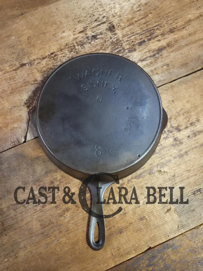 A favorite of ours! 1895 1910’s! Wagner Sidney #8 Cast Iron Skillet double Arc Logo and black iron Finish. Beautiful