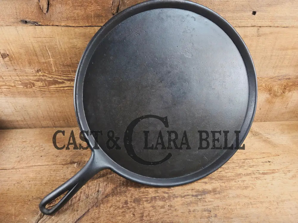 Amazing! Antique #14 handled gate marked round griddle! We’ve never seen one like this. PERFECT pizza peel or griddle