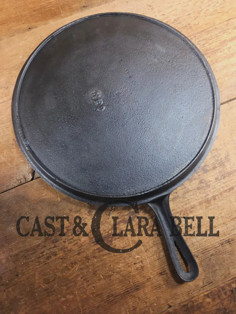 Amazing! Antique #14 handled gate marked round griddle! We’ve never seen one like this. PERFECT pizza peel or griddle