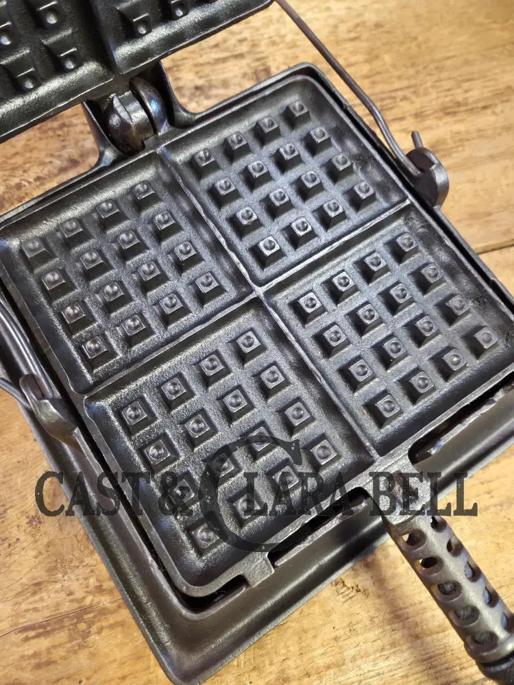 An absolute favorite! 1910’s Era HTF 1920’s Griswold #11 Square Waffle Iron w/ Raised Letter New American Logo. Raised