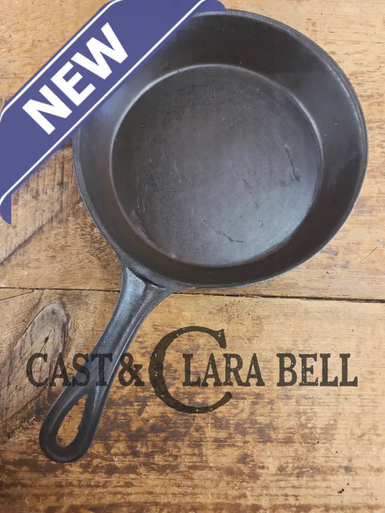 Antique gate-marked unknown #6 skillet. Est 1880’s. Left single spout heat ring bottom w/ fancy handle. Skillet