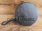 Antique gate-marked unknown #6 skillet. Est 1880’s. Left single spout heat ring bottom w/ fancy handle. Skillet