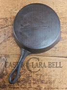 Antique gate-marked unknown #6 skillet. Est 1880’s. Left single spout heat ring bottom w/ fancy handle. Skillet