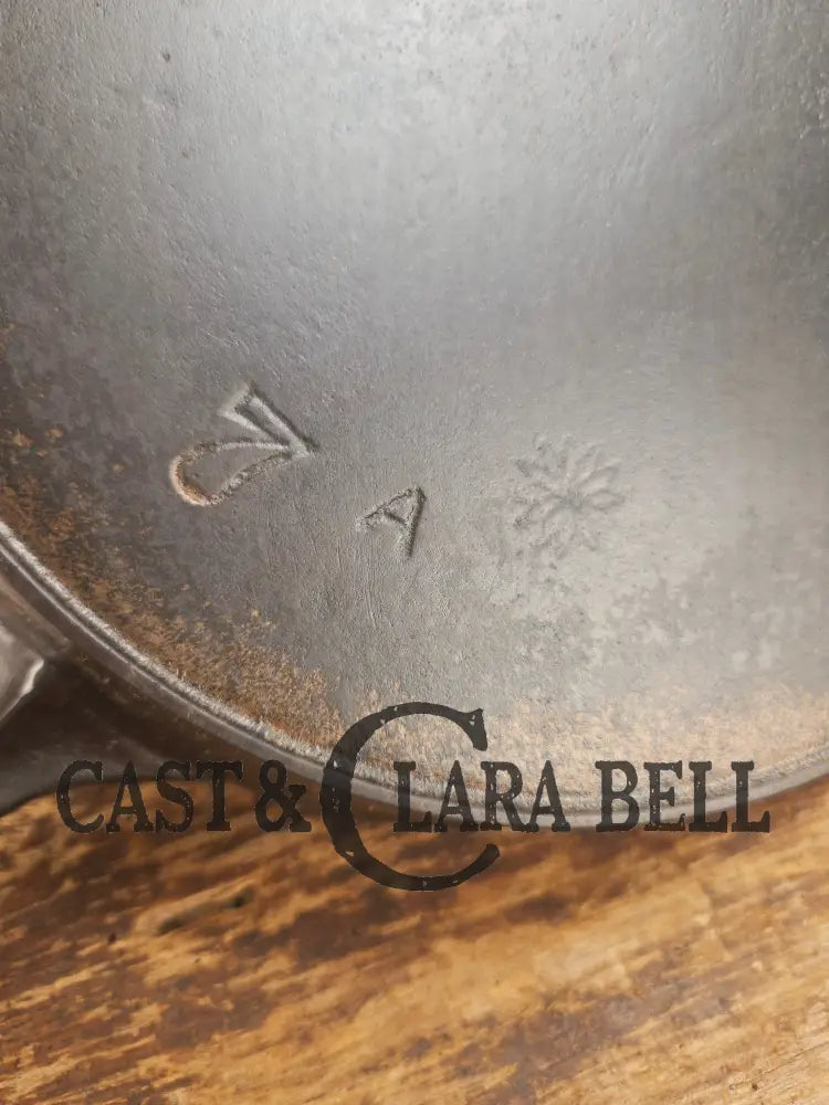 Awesome! 1890’s Griswold ERIE 2nd Series #7 Skillet with Heat Ring and Maker’s Mark Flower and nickel finish! Don’t