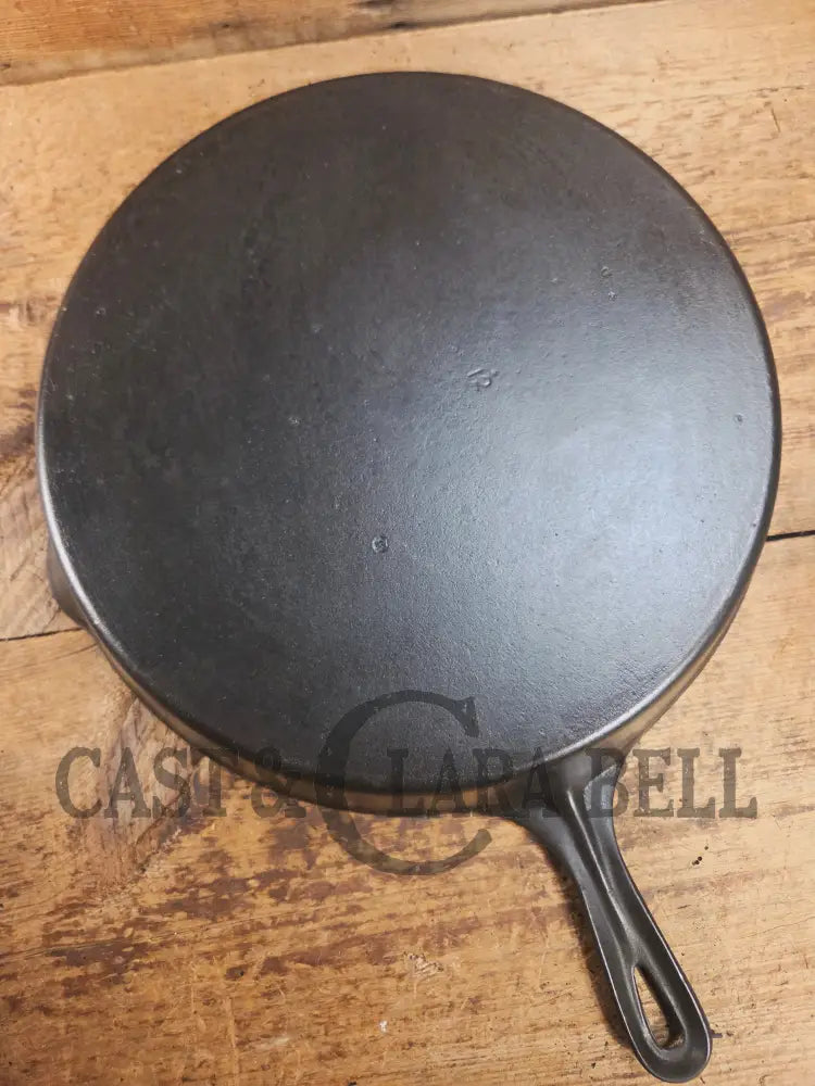 Awesome and tough to find! Scarce smooth bottom #12 Vollrath cast iron skillet. This is a conversation starter! Skillet